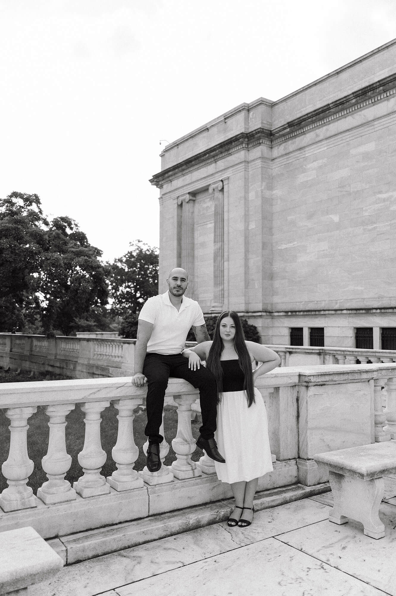 Couple posing together on the museum terrace.